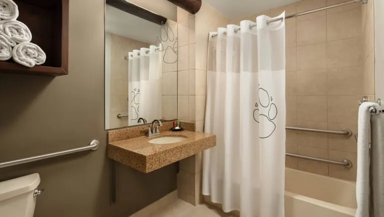 The accessible bathroom in the accessible Loft Fireplace Suite
